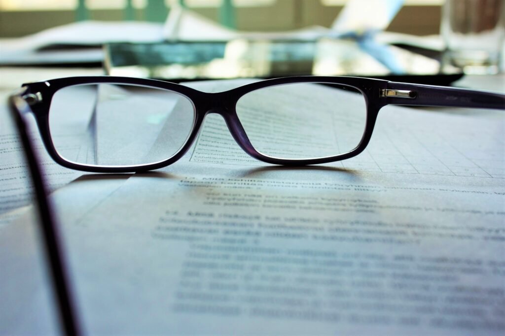 glasses on student notes - how to write a persuasive essay