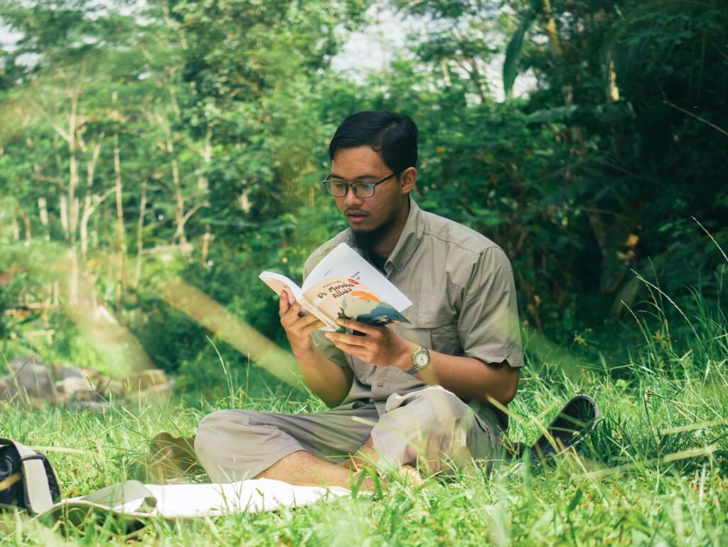 man reading a book - How to Write a Good Hook for an Essay