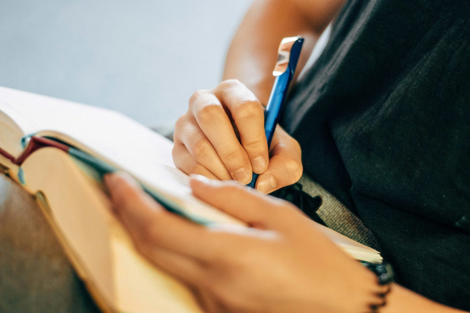 person with book enhancing his Study Skills