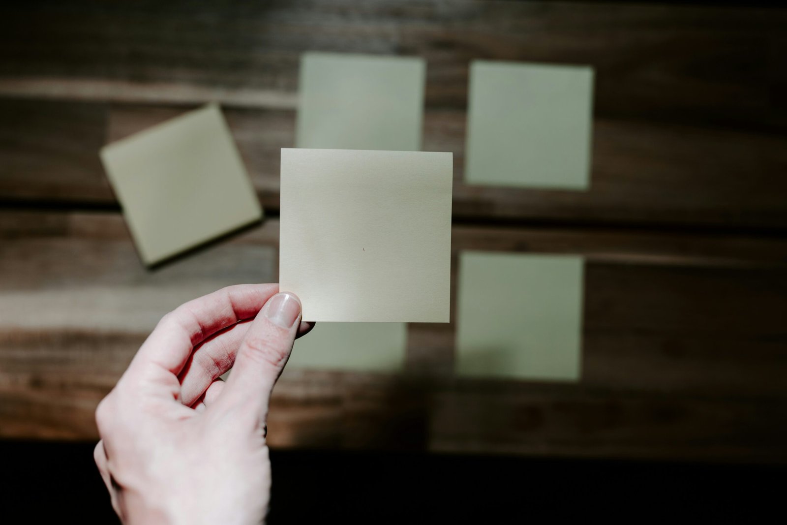 person holding a flash card - How To Make Flash Cards