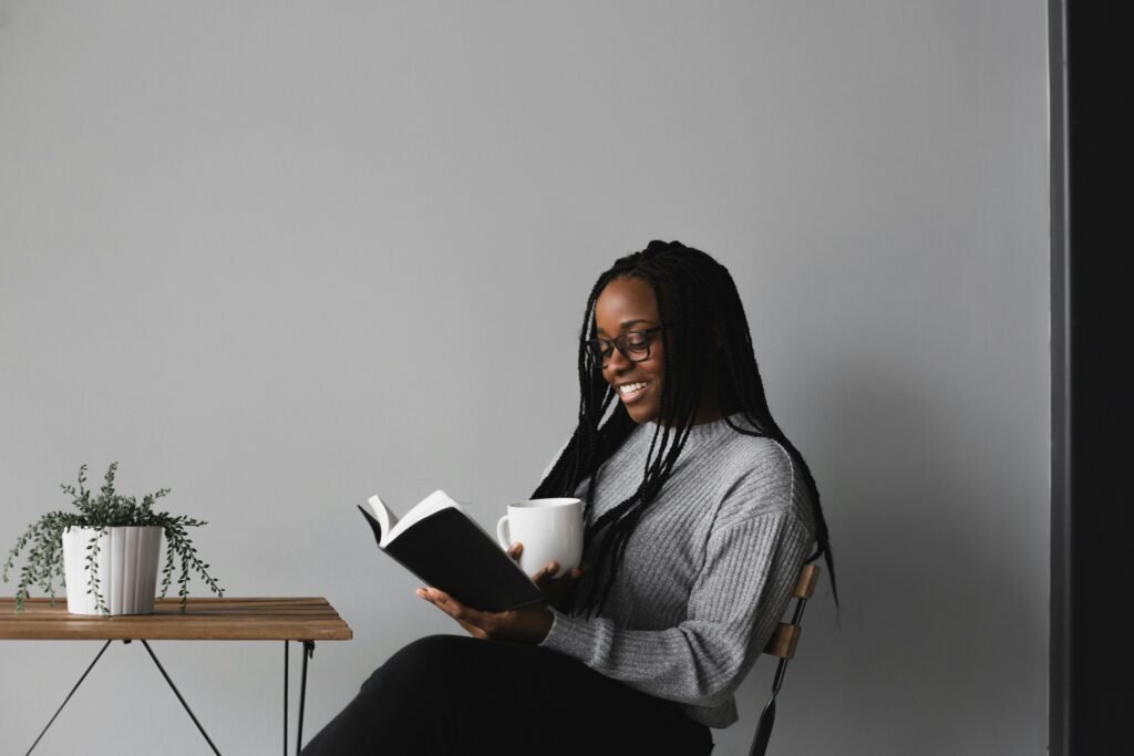 woman reading a book - SAT Vocabulary Flashcard