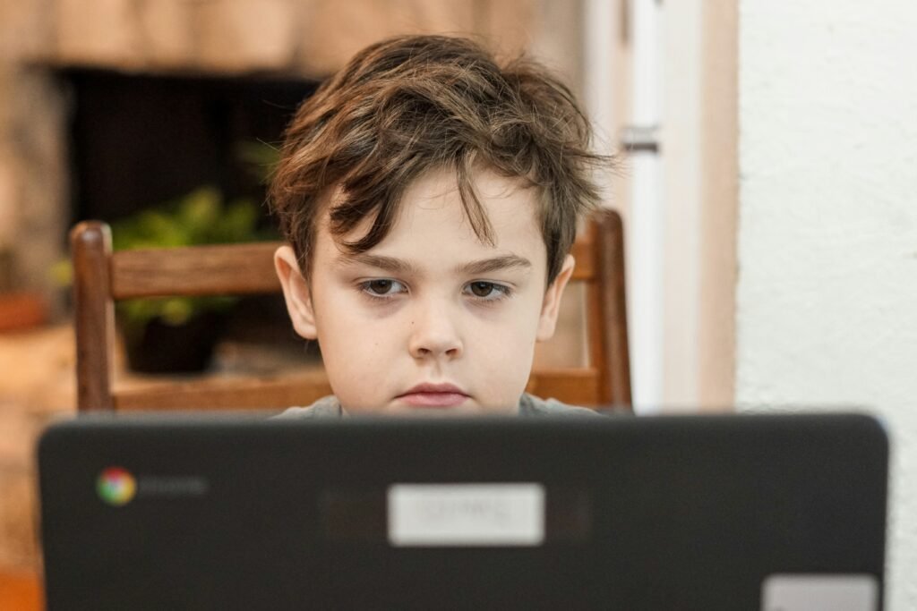 A Boy Looking at the ChromeBook - Best SAT Prep App