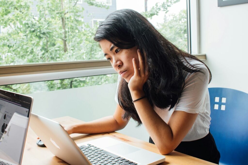 Girl Studying on Laptop - How to Use Ai to Write a Paper