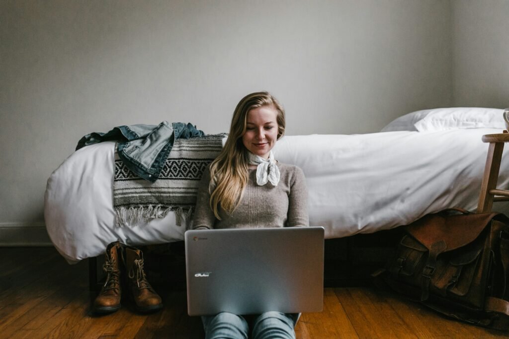 Person Working on Laptop - Essay About Bullying