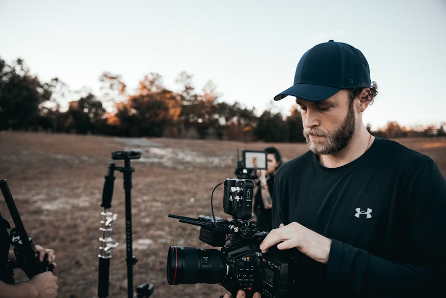 man using a camera - Is a Documentary a Primary Source
