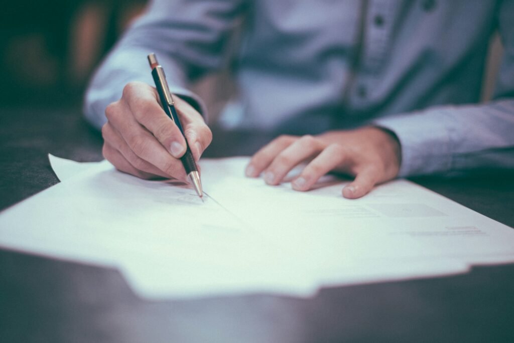 Person Working - Finance Research Paper Writing