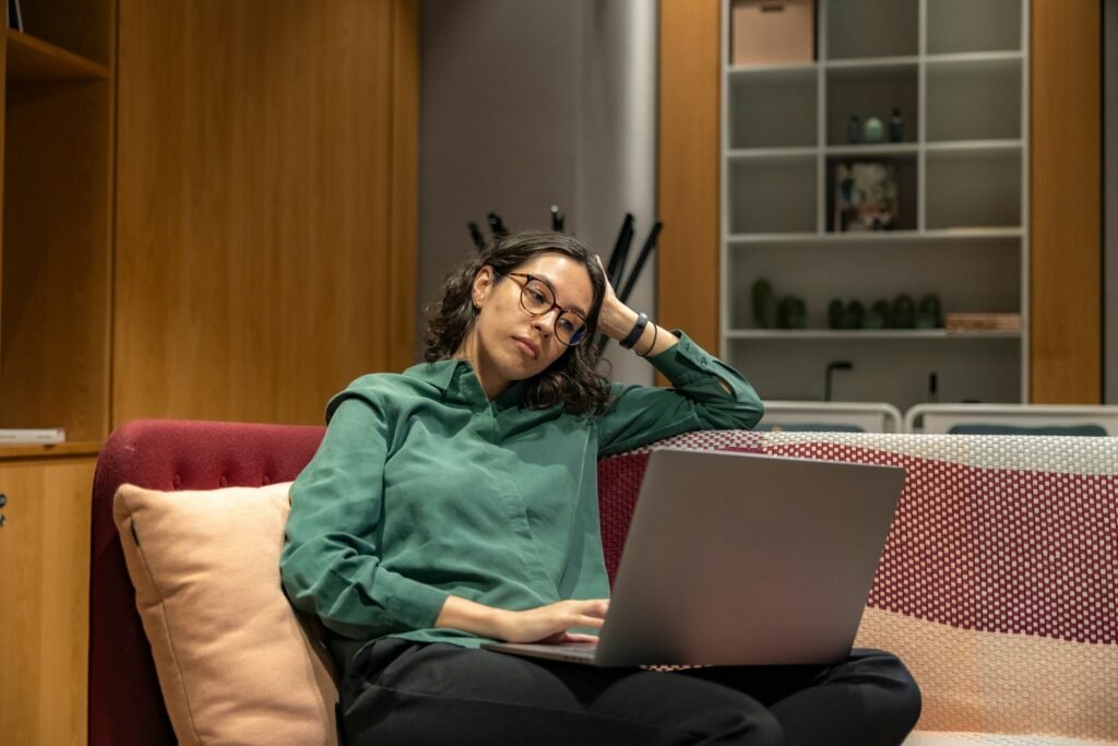 Girl Working on Laptop - Informative Essay Topics